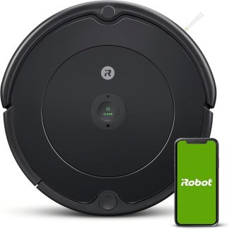iRobot Roomba 694 robot vacuum in a living room cleaning carpets and hard floors