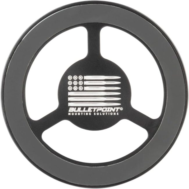 Black circular magnetic phone holder by BulletPoint Mounting Solutions with a logo featuring an American flag design