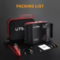 Contents of the UTRAI Jump Starter and Air Compressor Kit, including the unit, carrying case, jumper cables, adapter cable, USB cable, manual, and air compressor nozzles