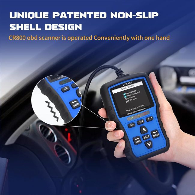 Hand holding a CR800 OBD scanner with blue and black design, displaying diagnostic data in a car