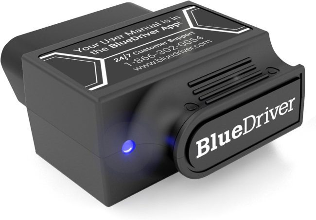 BlueDriver scan tool connected to a car's OBD port for real-time vehicle diagnostics