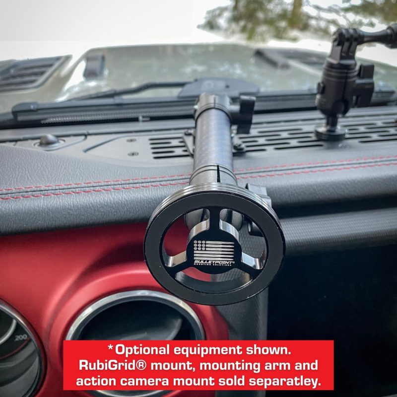 RubiGrid® mount system with mounting arm and action camera on a car dashboard featuring magnetic phone holder