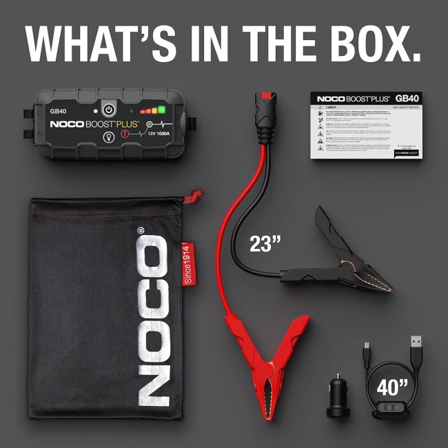 Contents of NOCO Boost Plus GB40 jump starter kit including battery clamps, USB cable, car charger, carrying bag, and user manual