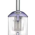 Shark Navigator bagless upright vacuum cleaner in purple with clear dust container