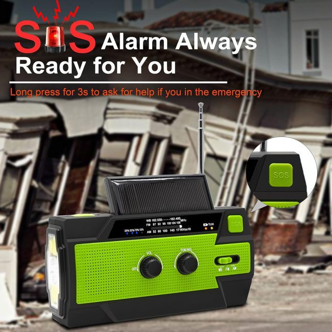 Emergency radio with SOS alarm button, solar panel, flashlight, and tuning controls, set against a backdrop of a damaged building.