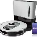 Shark AV2511AE AI Ultra Robot Vacuum showcasing its powerful suction capability on mixed flooring