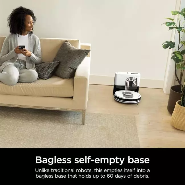 Shark Robot Vacuum's self-emptying base with 60-day dirt capacity, no bag needed