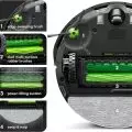 Roomba Combo j5 robot vacuum and mop switched to mopping mode, leaving a shiny floor behind