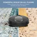 Shark IQ Robot's multi-surface brushroll effectively cleaning both carpets and hard floors