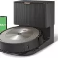 Roomba j9+ showcasing its powerful suction and pet hair cleaning capabilities on a carpet