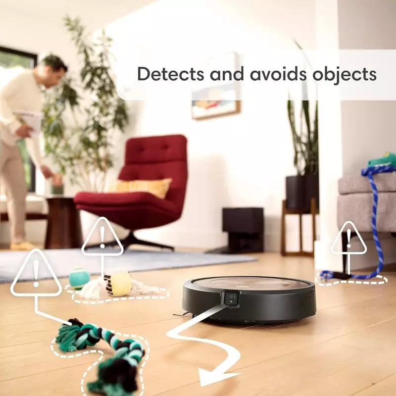 Self-emptying Roomba j9+ depositing debris into its 60-day capacity bin