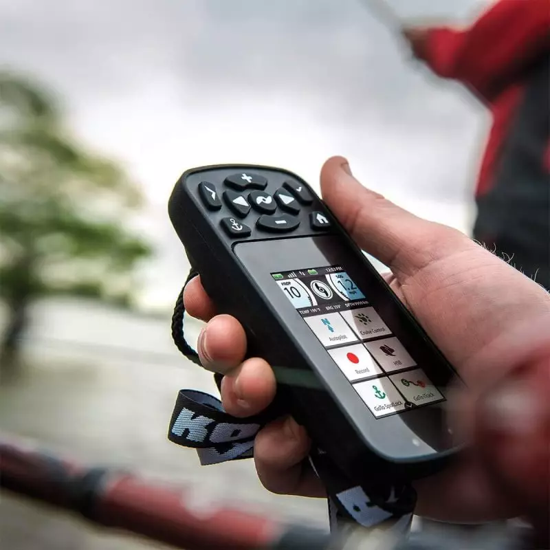 Operating the Minn Kota Terrova i-Pilot Link Remote | Precision Control in Hand User holding a Minn Kota Terrova i-Pilot Link remote showcasing its display and control buttons