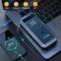 YaberAuto portable power station charging a laptop and a smartphone showing super fast charge