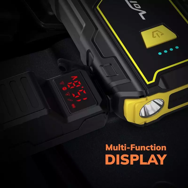 2000A Jump Starter with Multi-Function Display and USB Charging Port Portable 2000A car jump starter displaying various vehicle warning indicators and battery level