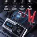 UTRAI jump starter displayed connected to a car battery, showcasing safety features such as short circuit and over-heat protection