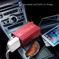 500W Power Inverter positioned on car console charging smartphone and tablet