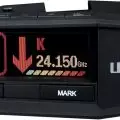 Uniden radar detector showing NE direction,   24.150 GHz frequency,   and signal strength,   with control buttons