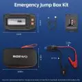 Emergency Jump Box Kit featuring a jump starter device, USB cable, battery clamps, user manual, and carrying case.