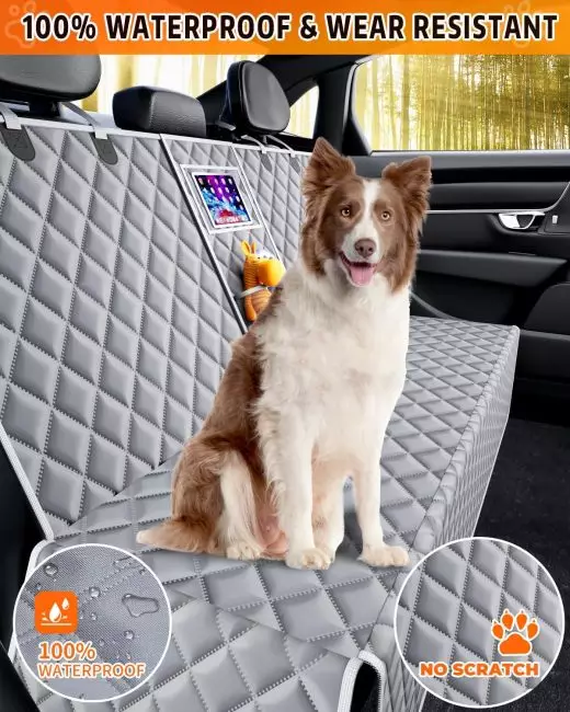 Dog sitting on a quilted, waterproof car seat cover designed for pets featuring a toy pocket and a tablet holder.