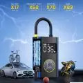 Image showcasing a portable battery-powered air compressor with versatility for inflating car,   motorcycle,   bike tires,   and balls.