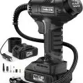 DORMZIE portable electric air compressor with digital display,   20V lithium-ion battery,   nozzle attachments,   air hose,   and 12V power adapter for car tires and inflatables
