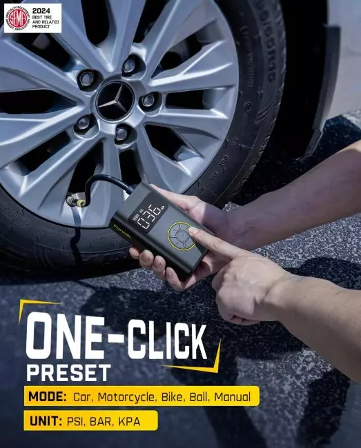 Person using a digital tire inflator to check car tire pressure with display showing pressure reading