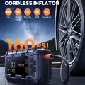 Cordless inflator with digital display inflating a car tire,   suitable for cars,   bicycles,   motorcycles,   balls,   and other items,   up to 160 PSI capacity