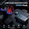 Portable jump starter with 3500A peak power for 12-volt car batteries,   supporting up to 8.0L diesel engines,   shown with red and black clamps connected to a car battery